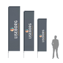 Tre rektangulære strandflag i forskellige højder med teksten "LISEBORG Creative Company".