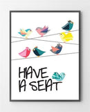 Farverige fugle sidder på ledninger, med teksten "HAVE A SEAT" nedenunder.