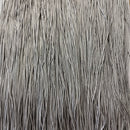 Mange lysegrå tråde hænger tæt sammen, minder om en flueforhængs tekstur.