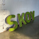 Super flotte mos bogstaver med en lime mosfarve.